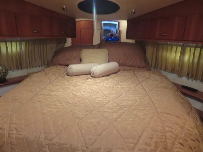 38 Special Yacht Photos Pics Luxurious bedroom interior of 2006 Carver 38 Super Sport yacht with plush bedding.