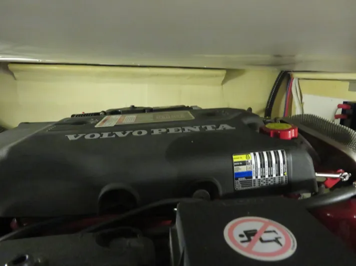 38 Special Yacht Photos Pics Volvo Penta engine in 2006 Carver 38 Super Sport boat, close-up view.