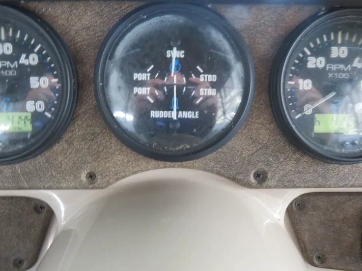 38 Special Yacht Photos Pics Dashboard of 2006 Carver 38 Super Sport with RPM and rudder angle gauges.