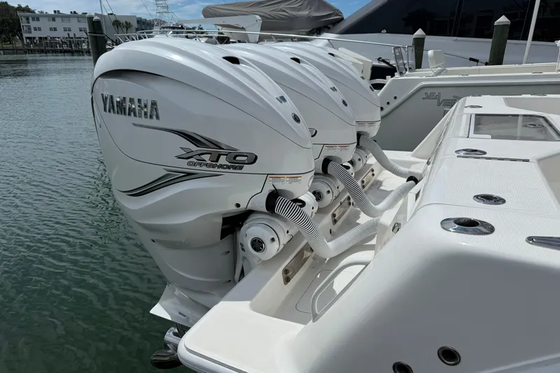  Yacht Photos Pics 2024 SeaVee 390Z boat with triple Yamaha XTO Offshore engines docked at marina.