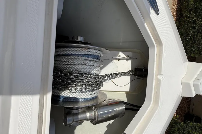  Yacht Photos Pics Anchor storage compartment of 2024 SeaVee 390Z boat with chain and rope.