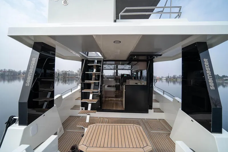 Sea Master Yacht Photos Pics Modern Cobra Sea Master 2025 yacht with sleek design and spacious deck area.