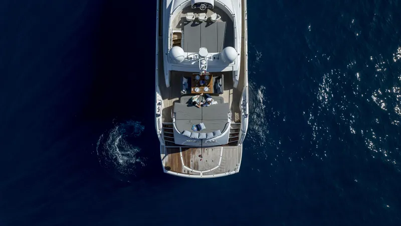 P'ocean Yacht Photos Pics Aerial view of 2009 Sunseeker Predator 84 yacht on deep blue ocean.