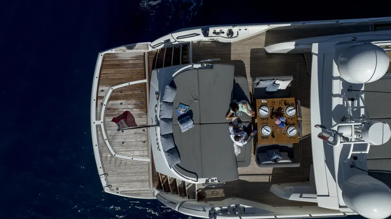 P'ocean Yacht Photos Pics Aerial view of 2009 Sunseeker Predator 84 yacht with deck seating and dining area.