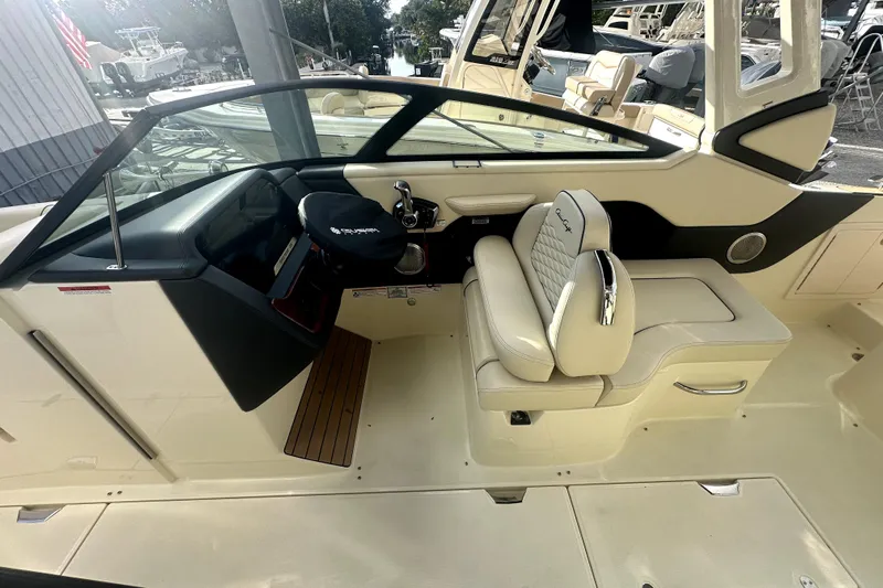  Yacht Photos Pics 2026 Chris-Craft Sportster 28 interior with luxurious seating and modern dashboard design.