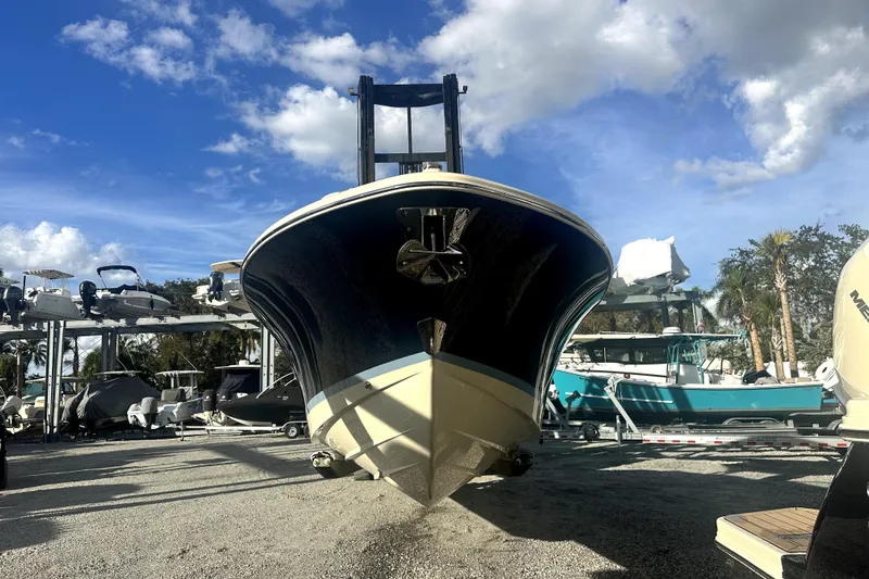  Yacht Photos Pics 2026 Chris-Craft Sportster 28 boat on display under a clear blue sky.