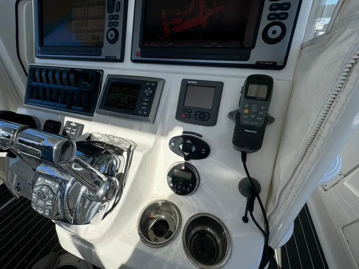  Yacht Photos Pics Control panel of a 2012 Boston Whaler 370 Outrage boat with navigation equipment.