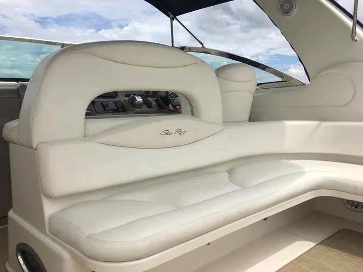  Yacht Photos Pics Luxurious interior of 2000 Sea Ray 410 Sundancer yacht with white leather seating.