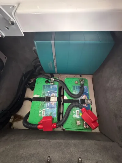  Yacht Photos Pics 2020 Sea Ray 290SDX boat battery compartment with dual green batteries and wiring.
