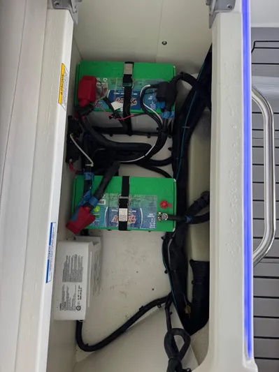  Yacht Photos Pics 2020 Sea Ray 290SDX boat battery compartment with dual green batteries.