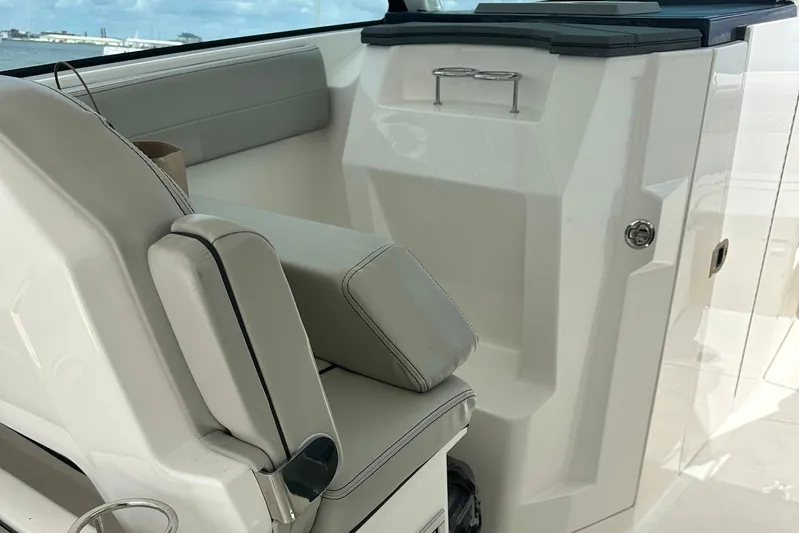 Sheminem Yacht Photos Pics 2023 Pursuit DC 295 Dual Console interior with sleek seating and modern design.
