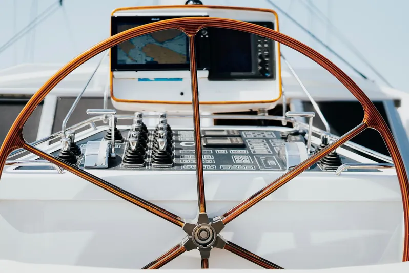 Eclipse Yacht Photos Pics Steering wheel and control panel of 1991 Alloy Yachts Dubois Design sailboat.