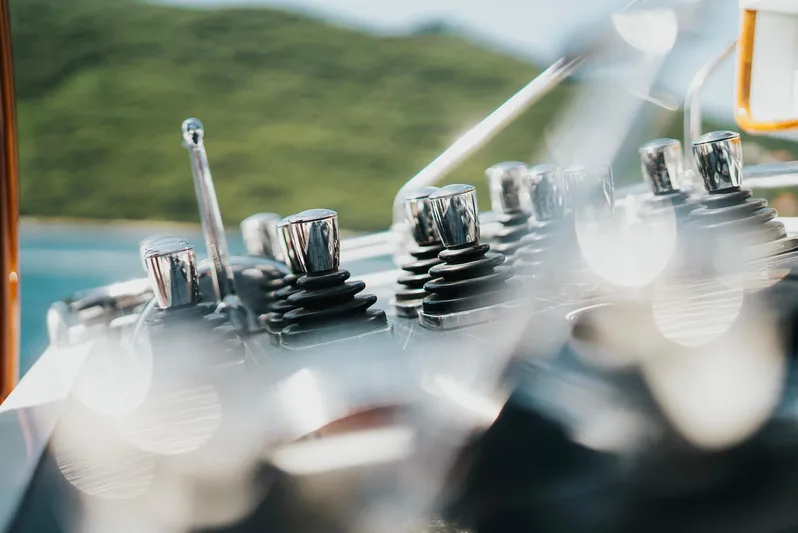 Eclipse Yacht Photos Pics Close-up of yacht controls, Alloy Yachts Dubois Design, 1991, with blurred scenic background.