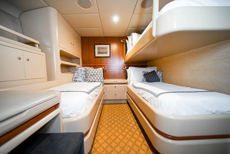 Eclipse Yacht Photos Pics Luxurious cabin interior of 1991 Alloy Yachts Dubois Design with twin beds and elegant decor.