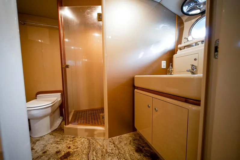 Eclipse Yacht Photos Pics Luxurious yacht bathroom with shower, sink, and toilet; Alloy Yachts Dubois Design, 1991.