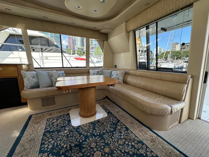Solana Yacht Photos Pics Luxurious interior of 2000 Bayliner 5288 Pilot House Motoryacht with plush seating and elegant decor.