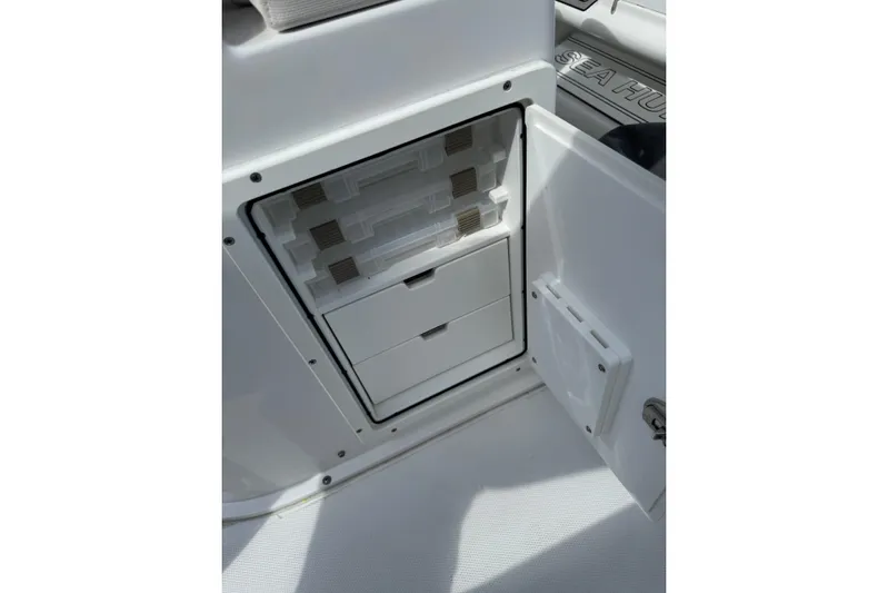  Yacht Photos Pics 2024 Sea Hunt Gamefish 27 storage compartment with tackle boxes and drawers.