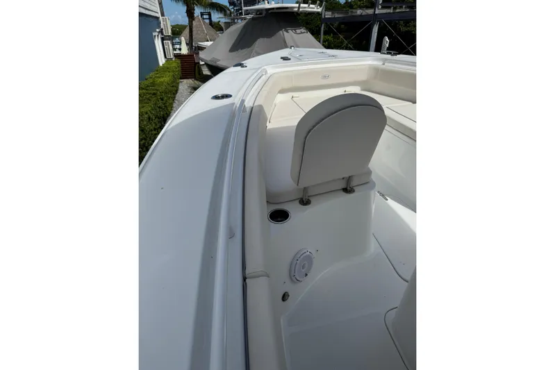  Yacht Photos Pics 2024 Sea Hunt Gamefish 27 Forward Seating boat interior with white seating and sleek design.