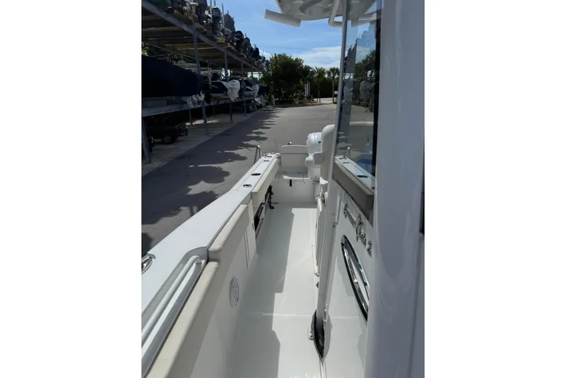  Yacht Photos Pics 2024 Sea Hunt Gamefish 27 Forward Seating boat, docked with visible interior walkway.