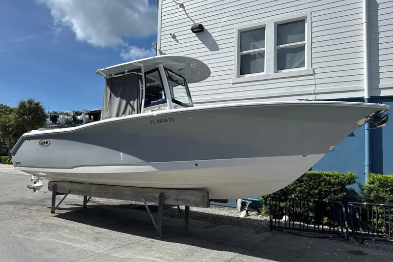  Yacht Photos Pics 2024 Sea Hunt Gamefish 27 Forward Seating boat displayed outdoors.