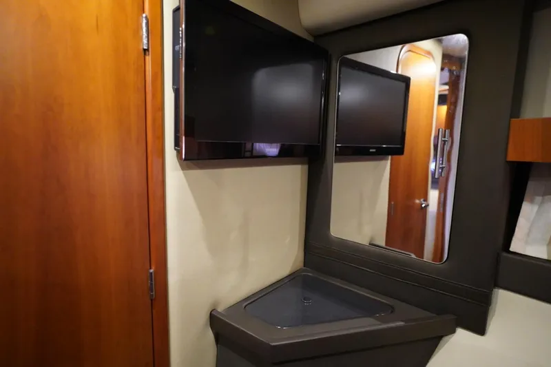  Yacht Photos Pics Interior of 2012 Regal 42 Sport Coupe with TV and mirror.