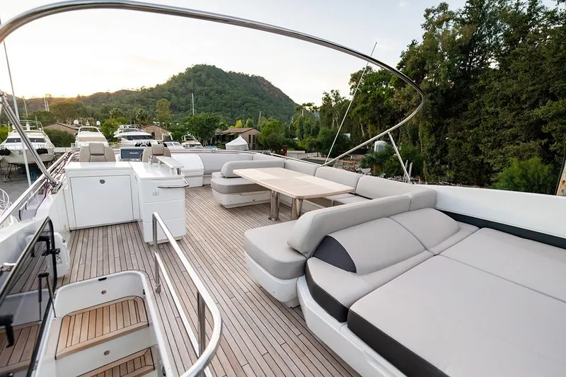 Daphne Yacht Photos Pics Luxurious 2018 Princess 68 yacht deck with elegant seating and scenic views.