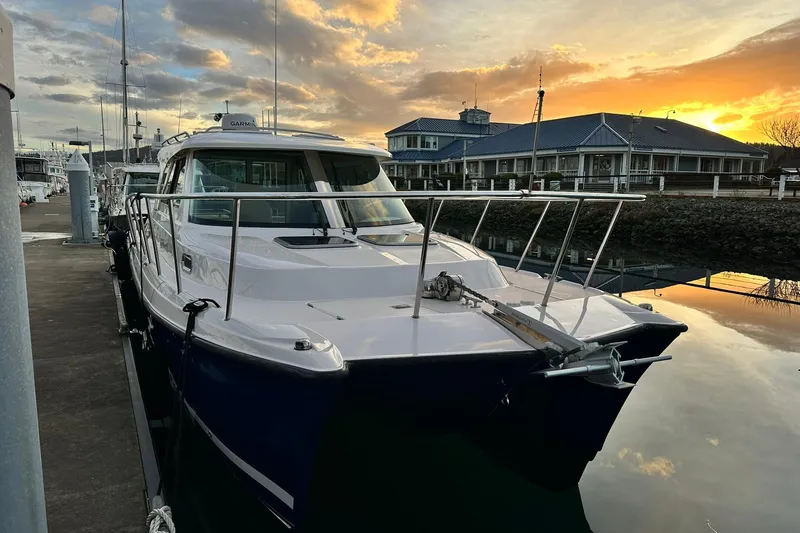  Yacht Photos Pics 2019 Aspen C107 boat docked at marina during sunset.
