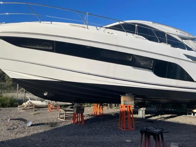  Yacht Photos Pics 2021 Fairline Targa 45 Open yacht on stands, side view, outdoors.