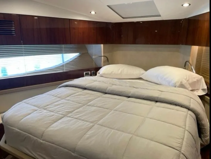  Yacht Photos Pics Luxurious bedroom interior of 2021 Fairline Targa 45 Open yacht.