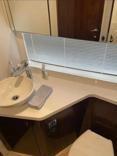  Yacht Photos Pics Modern bathroom in 2021 Fairline Targa 45 Open yacht with sleek sink and blinds.