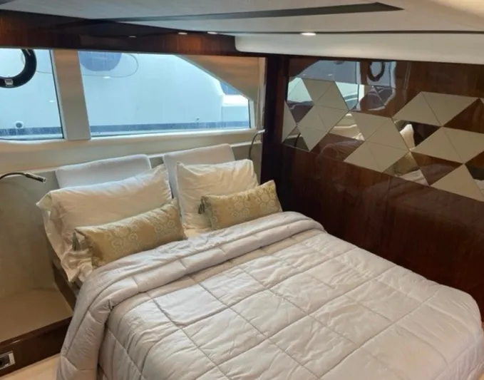  Yacht Photos Pics Luxurious bedroom interior of 2021 Fairline Targa 45 Open yacht with elegant bedding.
