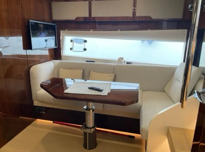 Yacht Photos Pics Interior of 2021 Fairline Targa 45 Open yacht with elegant seating and table.