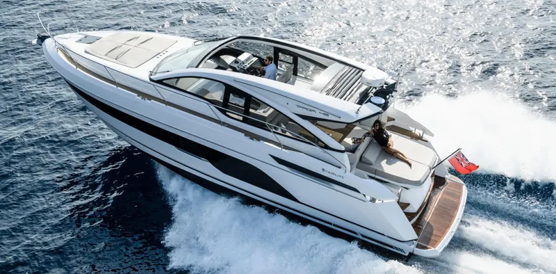  Yacht Photos Pics 2021 Fairline Targa 45 Open yacht cruising on open water, showcasing sleek design and luxury.