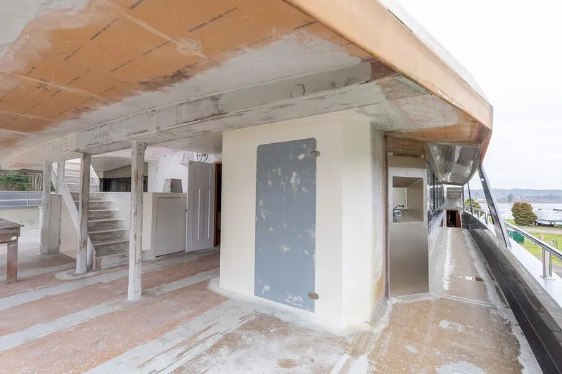 Mai Cat Yacht Photos Pics Unfinished interior of 2025 Catamaran Bloomfield 86 Motorsailor, showcasing construction details.