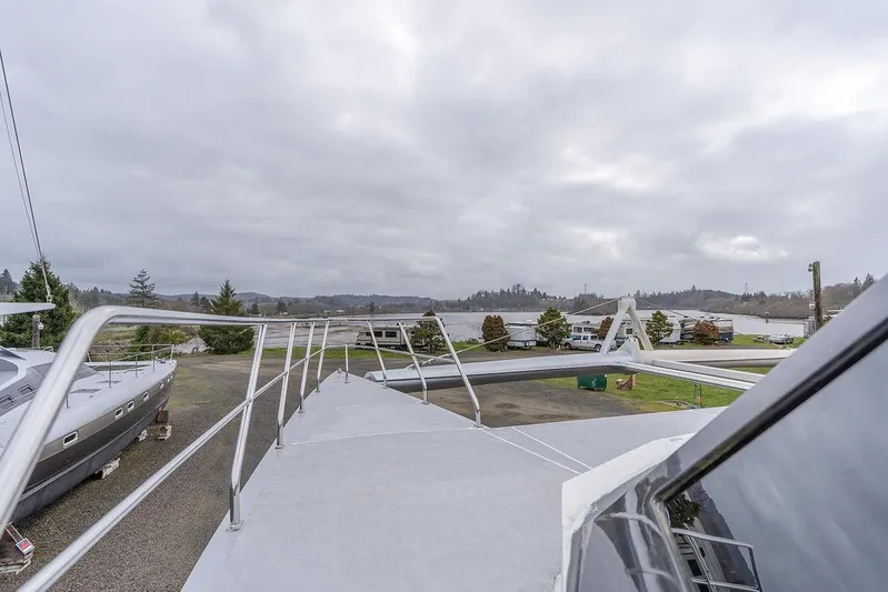 Mai Cat Yacht Photos Pics 2025 Catamaran Bloomfield 86 Motorsailor on land, showcasing deck and railing.