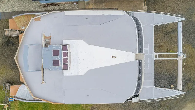 Mai Cat Yacht Photos Pics Aerial view of 2025 Catamaran Bloomfield 86 Motorsailor, showcasing deck layout and design.