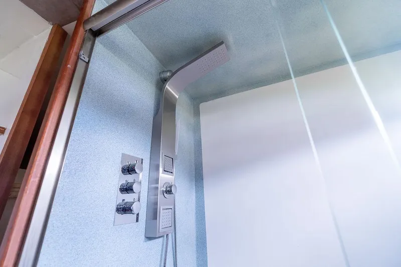 Mai Cat Yacht Photos Pics Modern shower in 2025 Catamaran Bloomfield 86 Motorsailor, featuring sleek fixtures and glass enclosure.