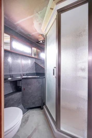 Mai Cat Yacht Photos Pics Modern bathroom in 2025 Catamaran Bloomfield 86 Motorsailor with shower and sleek design.