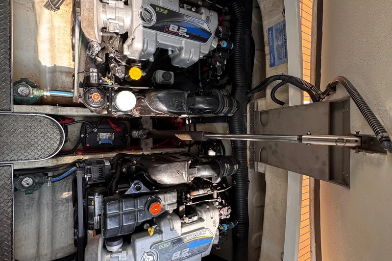 Love Shact Yacht Photos Pics Engine compartment of a 2012 Formula 37 PC boat, featuring dual MerCruiser 8.2 engines.