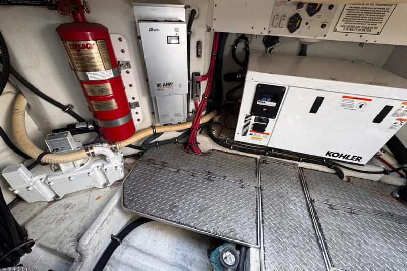 Love Shact Yacht Photos Pics Engine room of 2012 Formula 37 PC with Kohler generator and fire extinguisher.