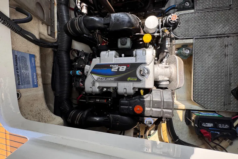 Love Shact Yacht Photos Pics Engine compartment of a 2012 Formula 37 PC boat, featuring a MerCruiser engine.