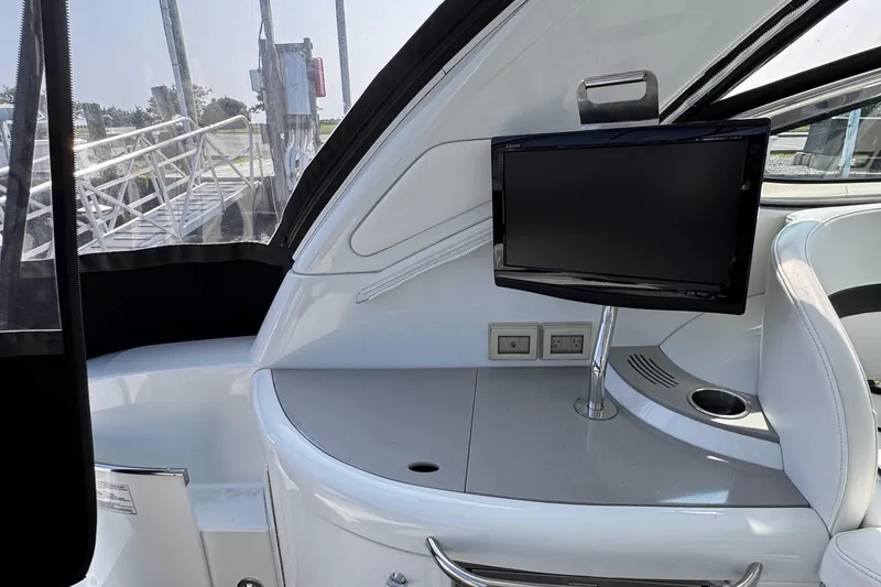 Love Shact Yacht Photos Pics Interior of a 2012 Formula 37 PC yacht with a mounted TV and sleek design.