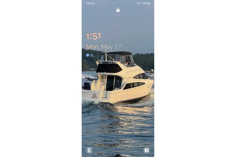 38 Special Yacht Photos Pics 2006 Carver 38 Super Sport yacht cruising on a sunny day, displaying phone lock screen.
