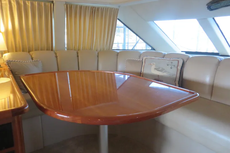 38 Special Yacht Photos Pics Luxurious interior of 2006 Carver 38 Super Sport yacht with elegant seating and table.