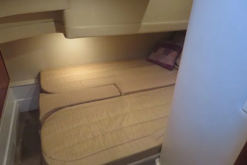 38 Special Yacht Photos Pics 2006 Carver 38 Super Sport cabin with twin beds and cozy lighting.