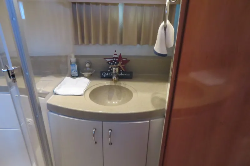 38 Special Yacht Photos Pics Bathroom interior of 2006 Carver 38 Super Sport yacht with sink and decor.