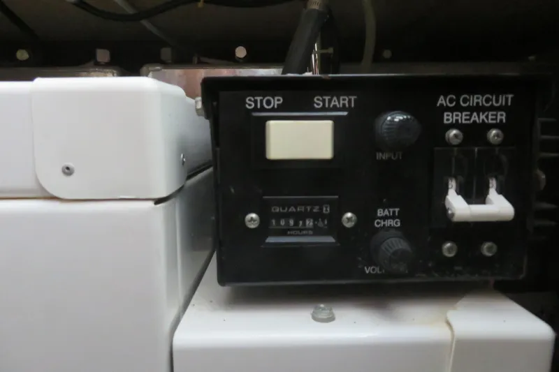 38 Special Yacht Photos Pics Control panel of a 2006 Carver 38 Super Sport boat with start, stop, and circuit breaker.