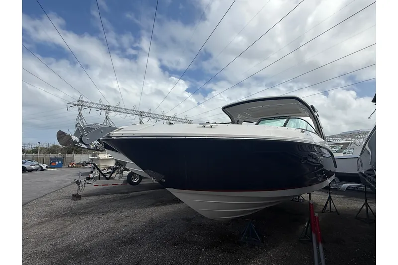  Yacht Photos Pics 2020 Sea Ray SLX 350 Outboard boat displayed outdoors under cloudy sky.