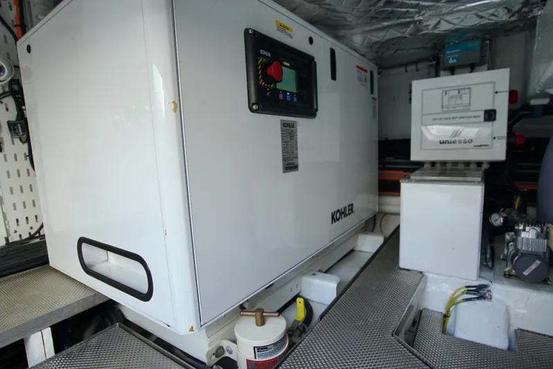  Yacht Photos Pics Engine room of 2024 Uniesse HTC5P yacht featuring Kohler generator.