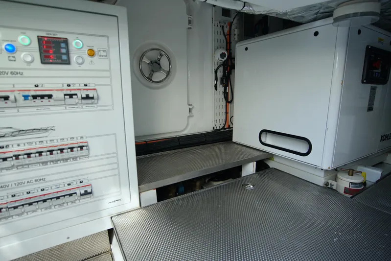  Yacht Photos Pics Engine room of 2024 Uniesse HTC5P yacht with control panels and equipment.